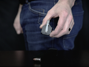 The NeoMag uses magnets to retain a spare magazine and clip inside the pocket.