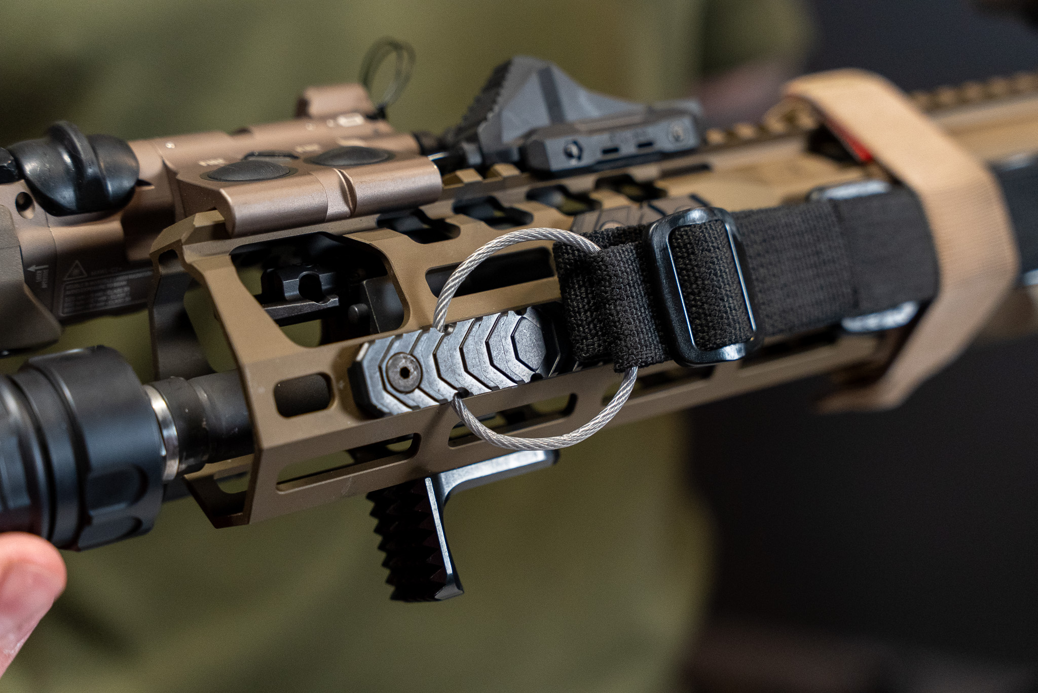 Rigs Sling Ring shown assembled with rifle sling on AR15.